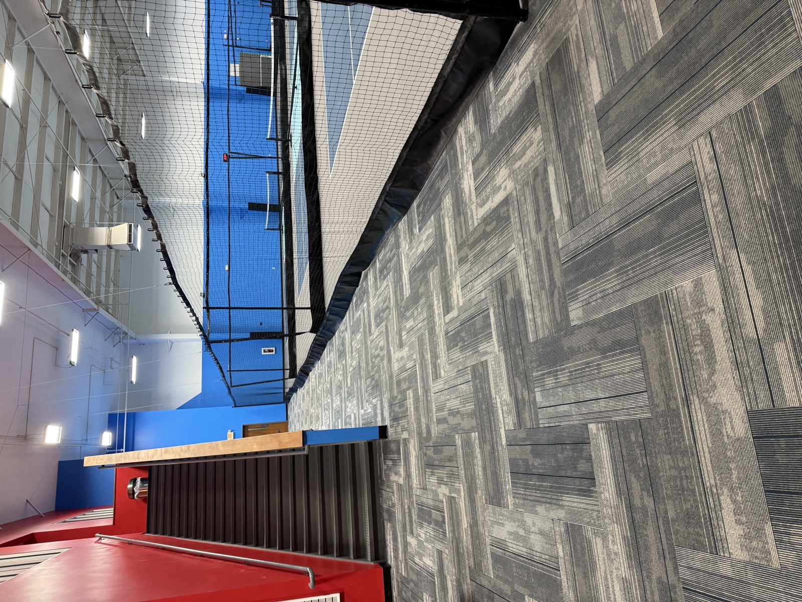 Modular carpet for indoor pickleball facility